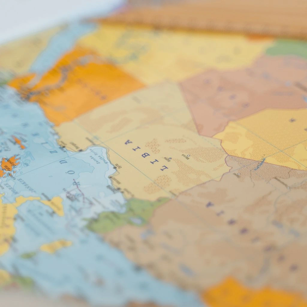 Typographic world map marking the four ICTPD Institute hubs: Geneva, Nairobi, Kuala Lumpur, and Bridgetown.